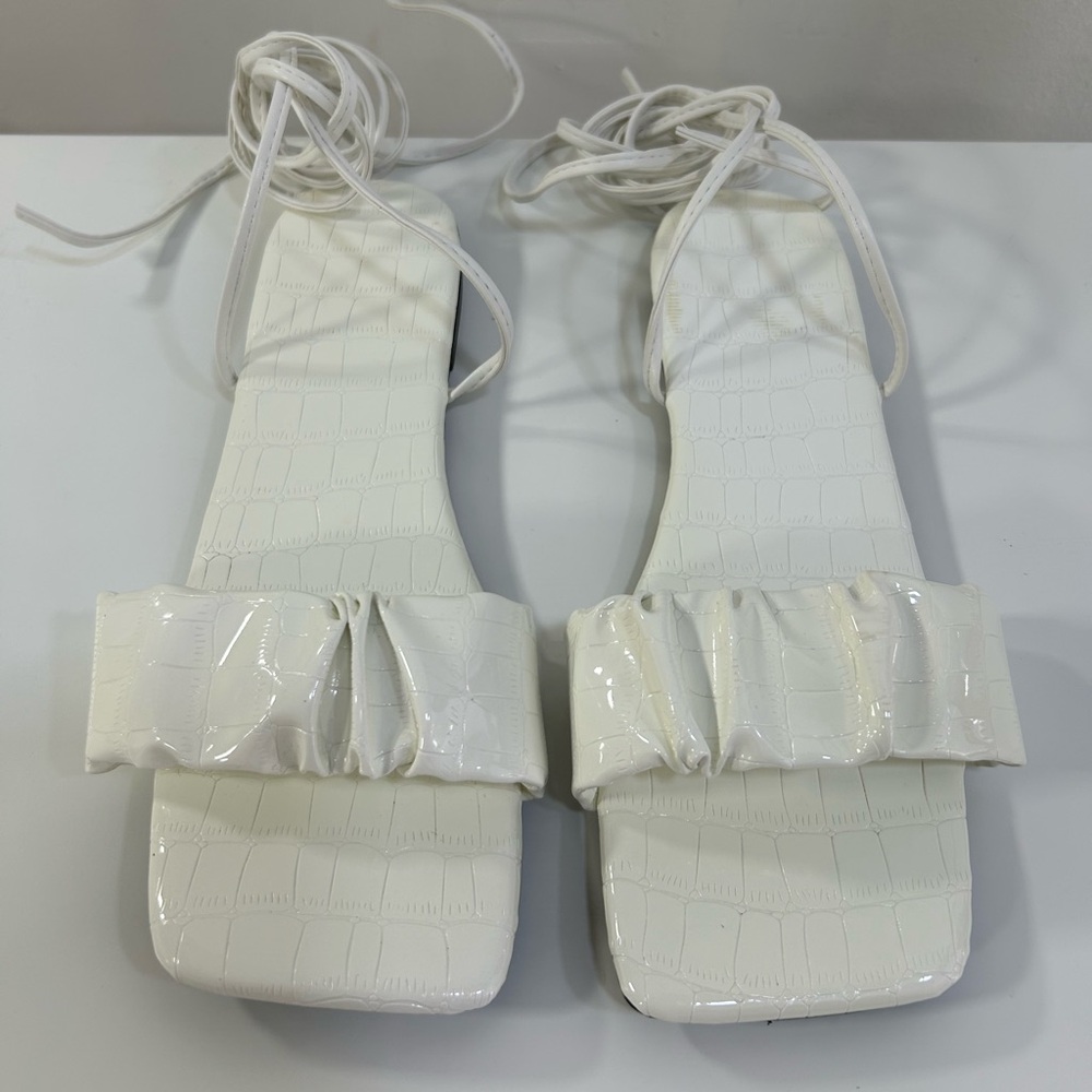 White embossed lace up Sandals